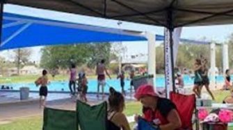 Peta MacGillivray surveying young people at Yuwaya Ngarra-li’s community data gathering at Walgett pool.