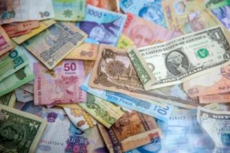 Photo of cash in various different currencies