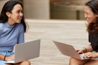 Photo of students studying outside