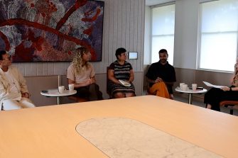 Bruce Watson, Rory Lewis, Peta MacGillivray, Dehan Silva and Ruth McCausland are sitting on a panel