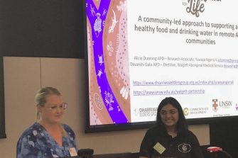 Alicia Dunning (left) and Devanshi Gala present the work of the Food & Water for Life program at the 2024 Food Governance Conference