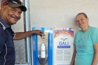 Chris Weatherall and Dharriwaa Elders Group's Community Response Lead Vanessa Hickey at DEG's Gali water kiosk. Photo: Tyrin Hickey