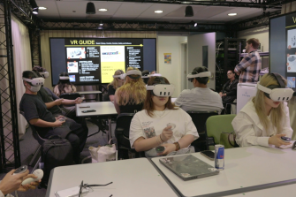 Students using VR headsets.