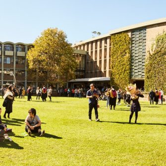Students and family celebrate graduation.