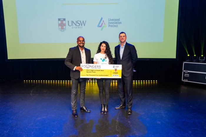 Executive Manager, Policy & Advocacy Business Western Sydney Alan Mascarenhas (left) and CEO Bradfield Development Authority Ken Morrison (right) presenting the second prize award to Aether Diagnostics.