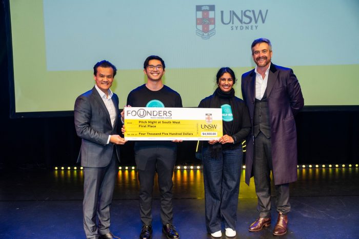 NSW Minister for Innovation, Science and Technology Anoulack Chanthivong (left) and UNSW Vice Chancellor and President Professor Attila Brungs (right) presented the first prize award to the founders of HELP NOW.