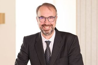 Headshot of Merlin Crossley