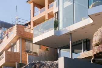 Apartment buildings, one with scaffolding