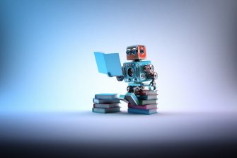 Robot sitting on a bunch of books and reading a book