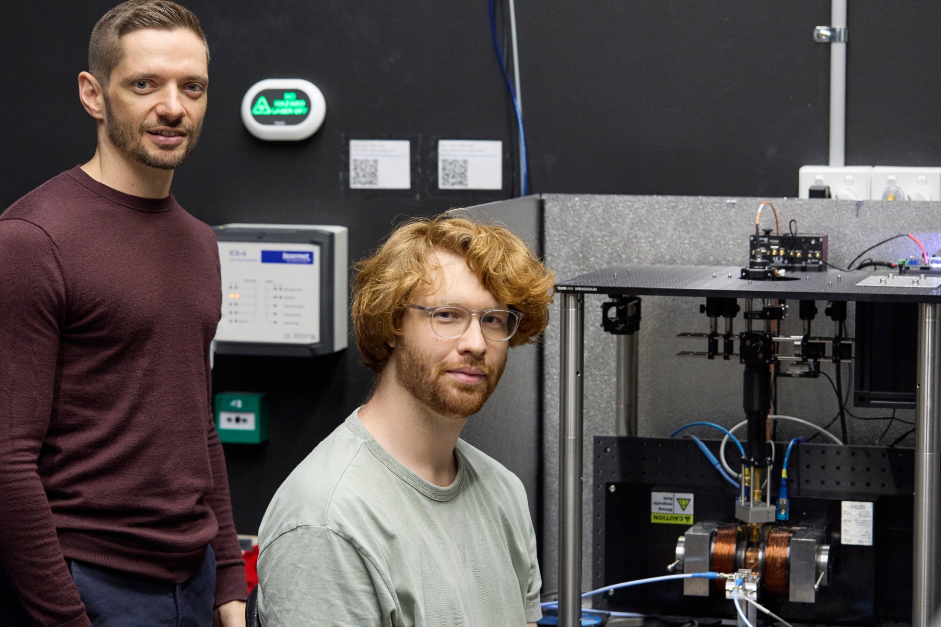 A/Prof. Jarryd Pla and Tom Day with the maser device.