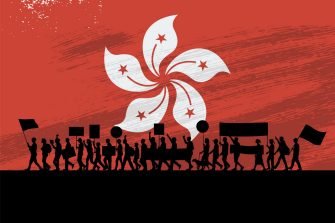 Silhouette of people protesting with a flag of Hong Kong as a background