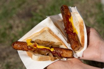 An election day sausage in bread from a BBQ, colloquially known as a sausage sizzle