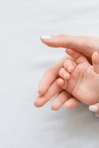 Group of multiethnic babies crawling isolated on white background