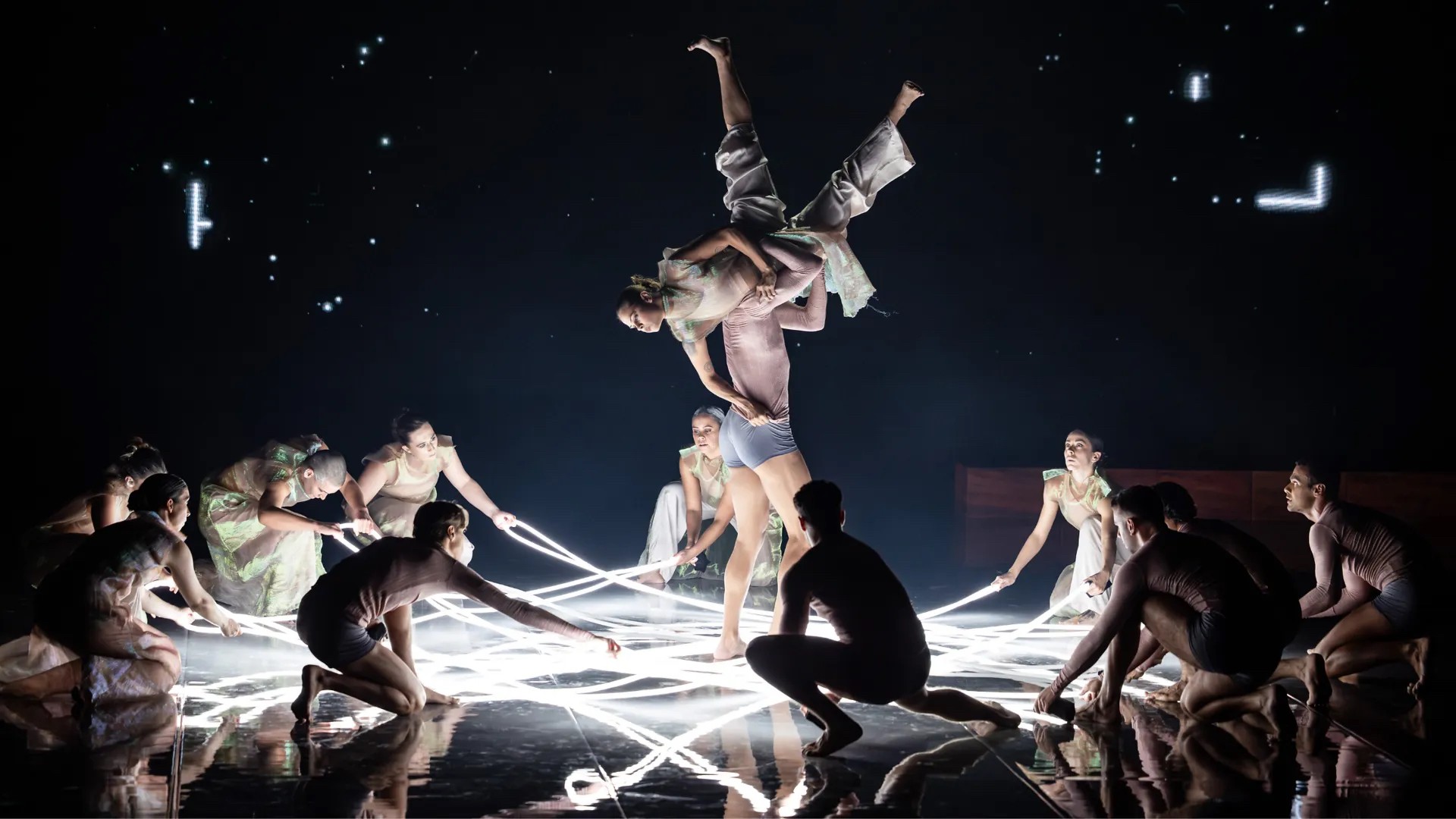 Image of stage featuring Illume dancers