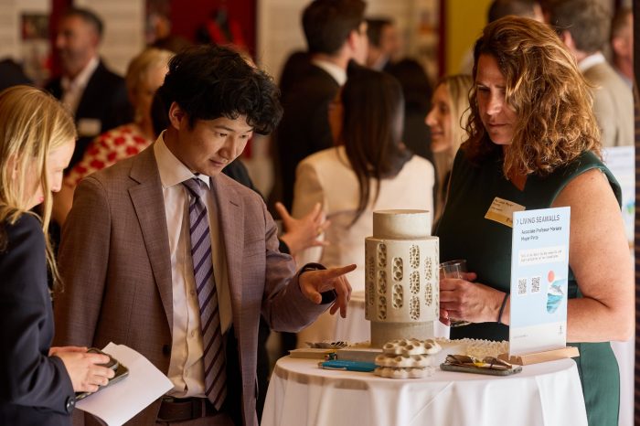 UNSW Associate Professor Mariana Mayer Pinto (right) at the Living Seawalls display.