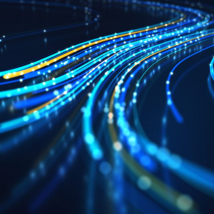 Close up of network data flowing on black background.