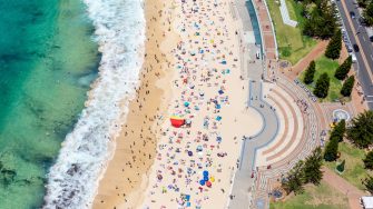 Wide angle view of Coogee Beach along Sydney Eastern Beaches in summer.