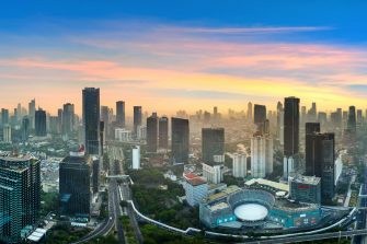Panorama of Jakarta city at sunrise, Indonesia.