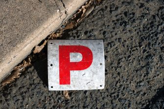A car that has crashed into a tree