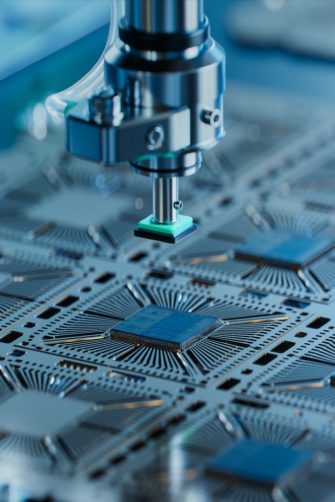 Close-up of Silicon Die are being Extracted from Semiconductor Wafer and Attached to Substrate by Pick and Place Machine. Computer Chip Manufacturing at Fab. Semiconductor Packaging Process.