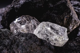 A breaking machine being used to crush spodumene ore in a lithium mine.