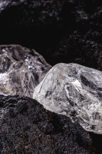 A breaking machine being used to crush spodumene ore in a lithium mine.
