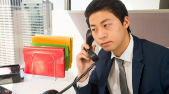 Photograph of office workers working