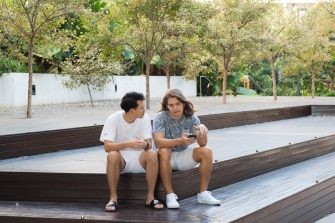 Group of students with friends having fun and socialising