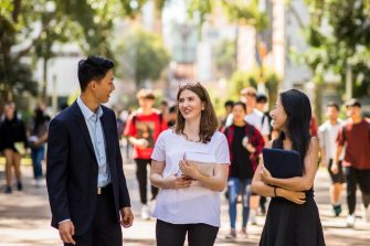 Students walking down the UNSW main walkway