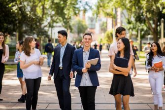 Students walking down the UNSW main walkway