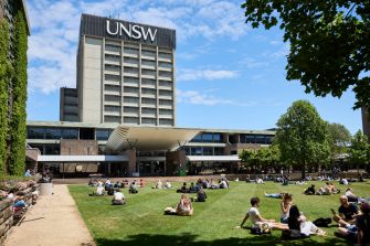 Students relaxing on Library lawn at Kensington UNSW.