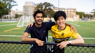 Students using UNSW's Village Green