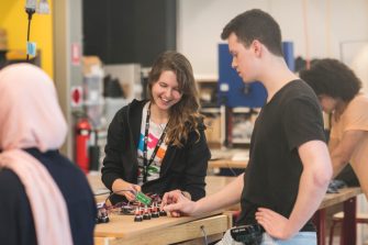 Students working with electrical components