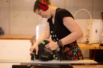 Student working with wood