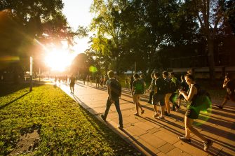 two students walking on campus