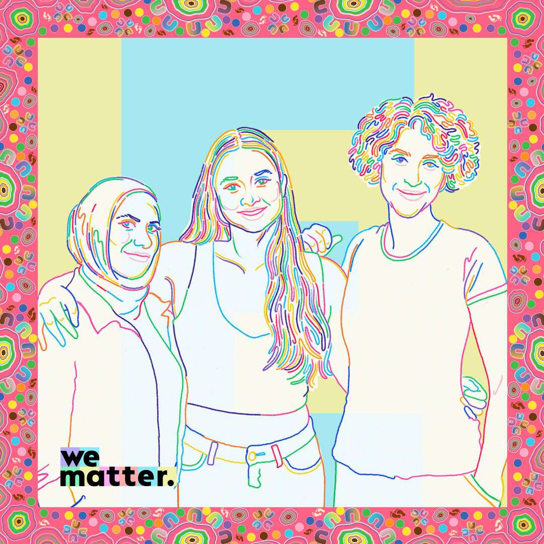 A group of three people, arms around each other