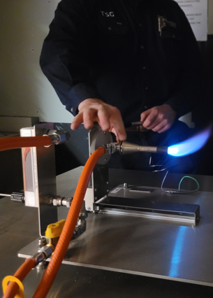 Scientist using fire device