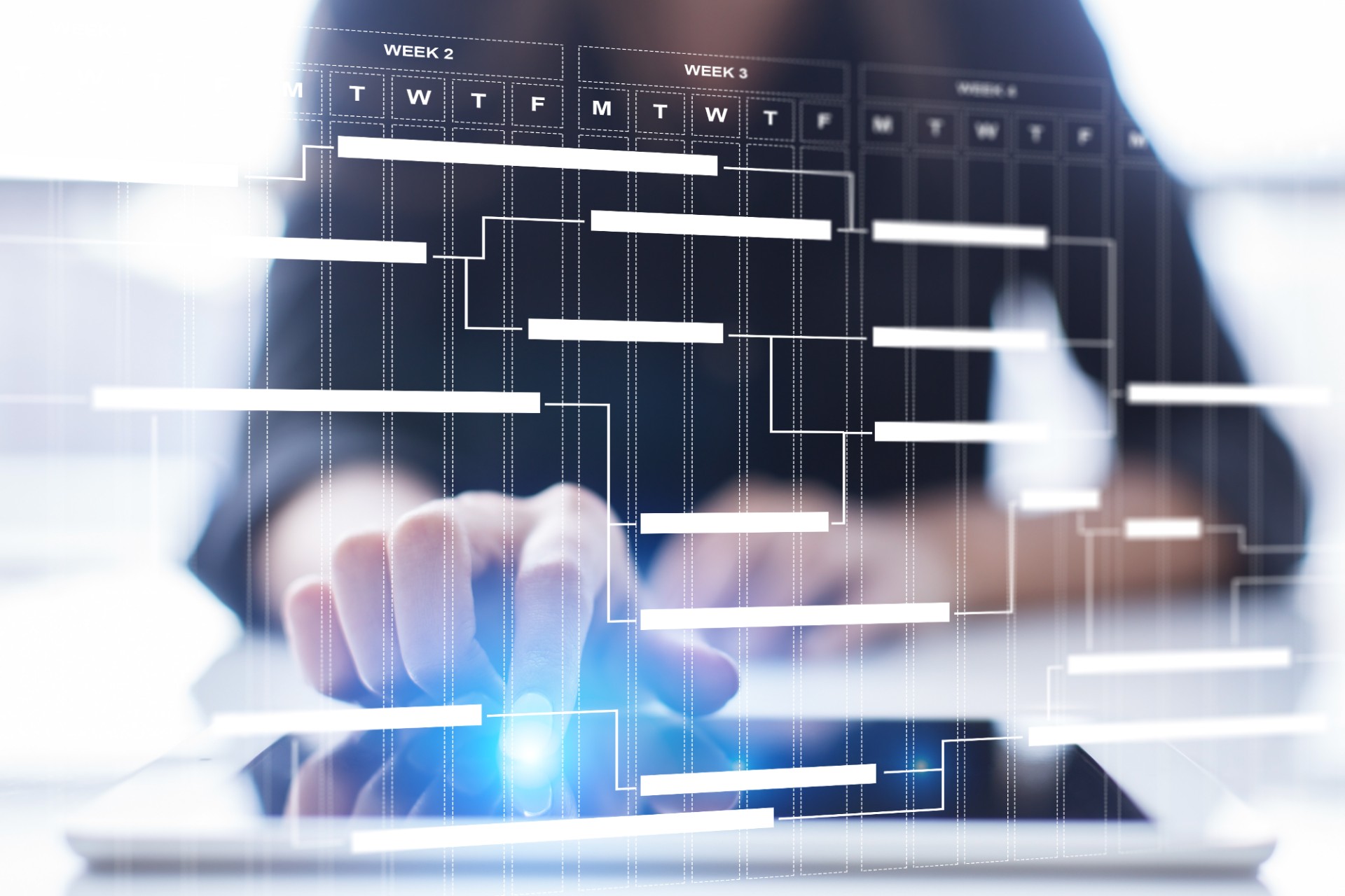 Graphic showing hands working at a tablet