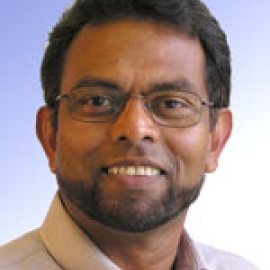 Member of Staff jay katupitiya headshot