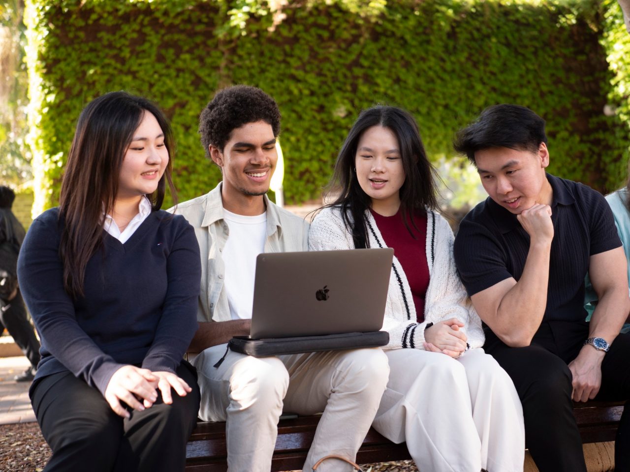 Group of students hanging out on university campus